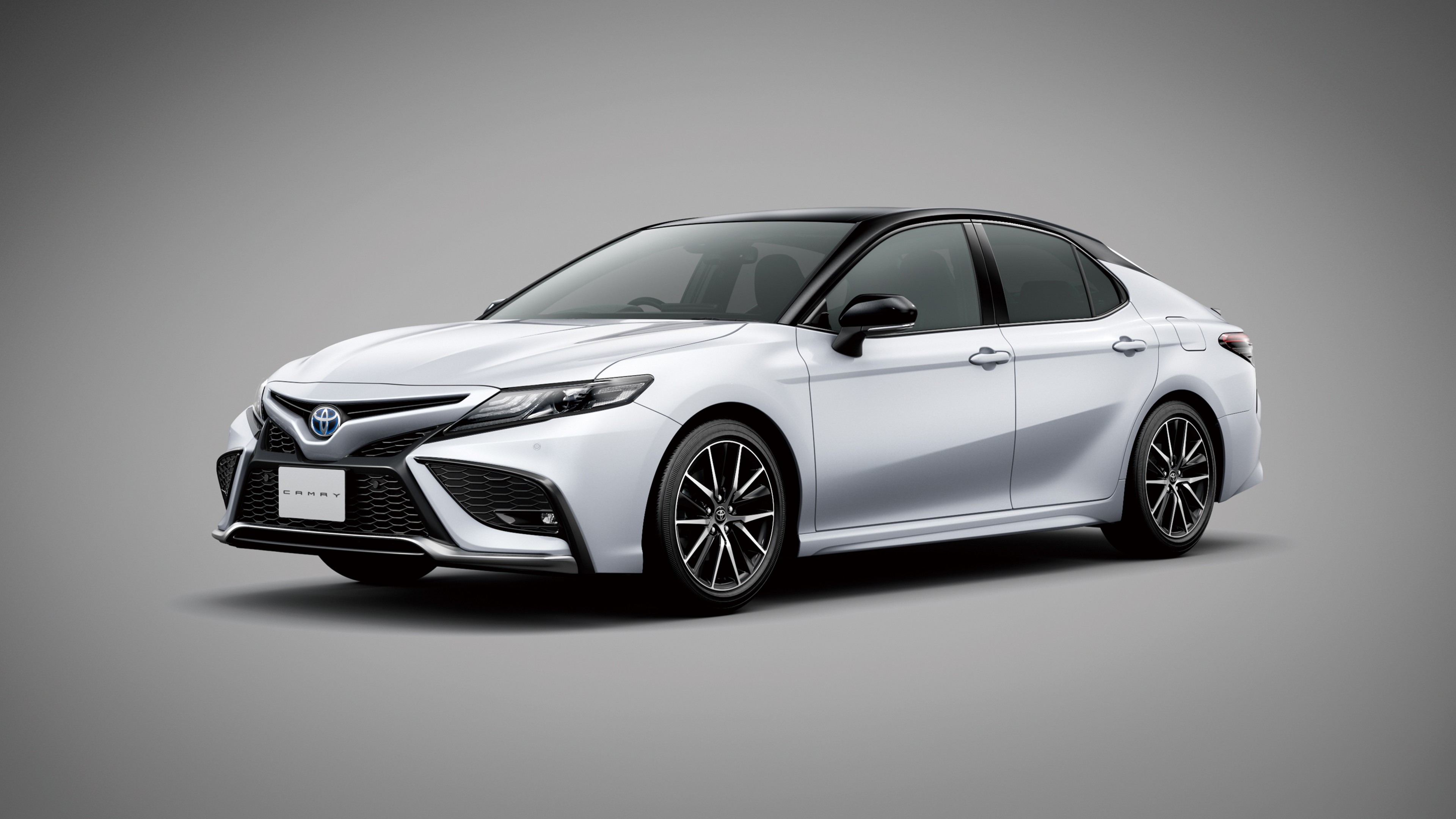White Toyota Camry contact page background